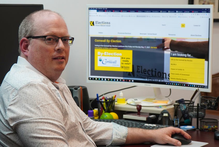 Tim Garrity, chief electoral officer with Elections P.E.I., visits the organization's website at his office in Charlottetown earlier this year. A citizens assembly will be tasked at exploring electoral systems for P.E.I. Guardian file