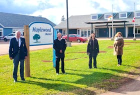 Alzheimer Society of P.E.I. president Nelson Hagerman, left, Health Minister Ernie Hudson, Alzheimer Society of P.E.I. CEO Jaime Constable and O’Leary support services co-ordinator Jaclyn Gallant stand outside of Maplewood Manor in Alberton.