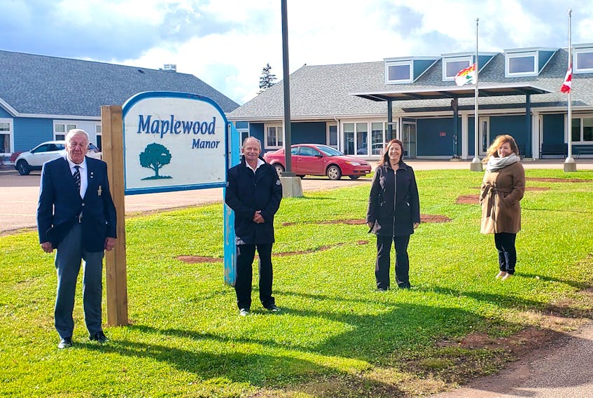 Alzheimer Society of P.E.I. president Nelson Hagerman, left, Health Minister Ernie Hudson, Alzheimer Society of P.E.I. CEO Jaime Constable and O’Leary support services co-ordinator Jaclyn Gallant stand outside of Maplewood Manor in Alberton.