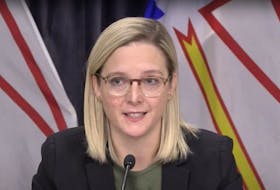 Dr. Natalie Bridger speaks during a news announcement in St. John's Tuesday, Nov. 23. (Image from YouTube)