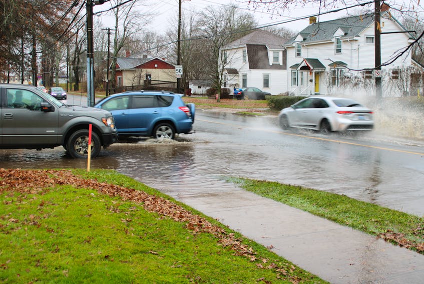 Rain brought flood conditions to the province, including a section of Arthur Street in Truro by the NSCC.