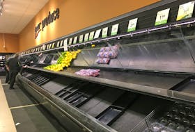 Produce shelves lie empty at the Save-On-Foods grocery store in Revelstoke, B.C. on Nov. 18, following flooding that ravaged the province’s transportation system. Rob Murphy/Handout via REUTERS