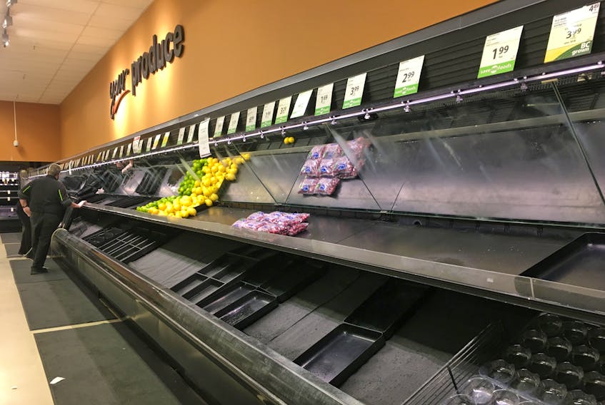 Produce shelves lie empty at the Save-On-Foods grocery store in Revelstoke, B.C. on Nov. 18, following flooding that ravaged the province’s transportation system. Rob Murphy/Handout via REUTERS