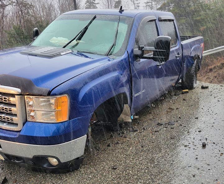 Ryan Moore doesn’t know how he made it across a section of Doyles Station Road that collapsed just as his pickup truck drove over it on Tuesday night. The road is one of several on the west coast that have been damaged by heavy rain.