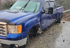 Ryan Moore doesn’t know how he made it across a section of Doyles Station Road that collapsed just as his pickup truck drove over it on Tuesday night. The road is one of several on the west coast that have been damaged by heavy rain.
