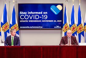 Nova Scotia Premier Tim Houston and Dr. Robert Strang, chief medical officer of health, hold a COVID-19 briefing Wednesday, Nov. 23, 2021, in Halifax.