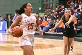 Cape Breton Capers forward Kiyara Letlow, left, looks to the basket during Atlantic University Sport women’s basketball action at Sullivan Field House in Sydney last month. Letlow currently leads the team in points per game (20.4). PHOTO CONTRIBUTED/VAUGHAN MERCHANT, CBU ATHLETICS.