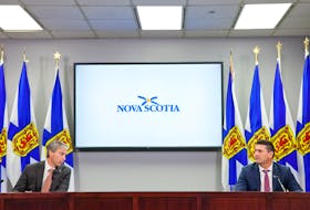 Nova Scotia Premier Tim Houston, left, named former Liberal MLA and cabinet minister Geoff MacLellan the head of a panel on housing in the Halifax Regional Municipality on Thursday, Nov. 25, 2021.