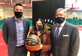 From the left, Canadian Elite Basketball League commissioner Mike Morreale, MUN president Vianne Timmons and Newfoundland Growlers owner Dean MacDonald at Field House, where news was announced that a Growlers teams will be joining the league for the upcoming season.