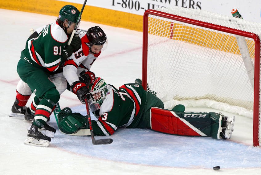 Nov. 26, 2021--Halifax Mooseheads' Senna Peeters gets involved as Rouyn-Noranda Huskies' Anthony Turcotte attempts a scoring attempt against goaltender Brady James late in the first period. No goal was scored on the play.
ERIC WYNNE/Chronicle Herald