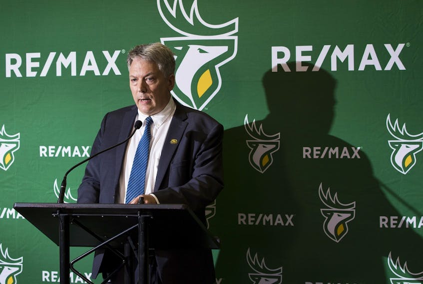 Edmonton Elks board chair Ian Murray announces the dismissal of president and CEO Chris Presson, general manager and vice-president of football operations Brock Sunderland and head coach Jaime Elizondo on Nov. 22, 2021 in Edmonton.
