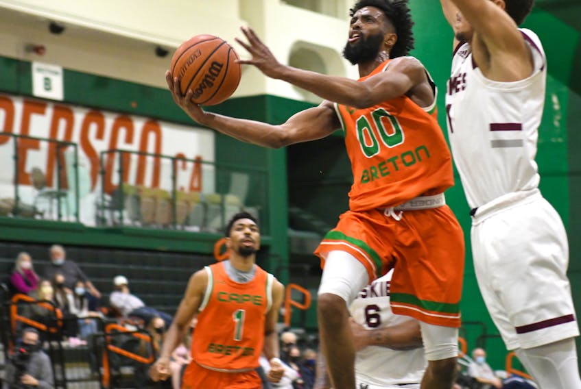 Osman Omar of the Cape Breton Capers drives to the hoop during an AUS men's basketball game Sunday afternoon against the visiting Saint Mary's Huskies. Omar scored 41 points in the Capers' 92-90 victory in overtime. - CBU ATHLETICS