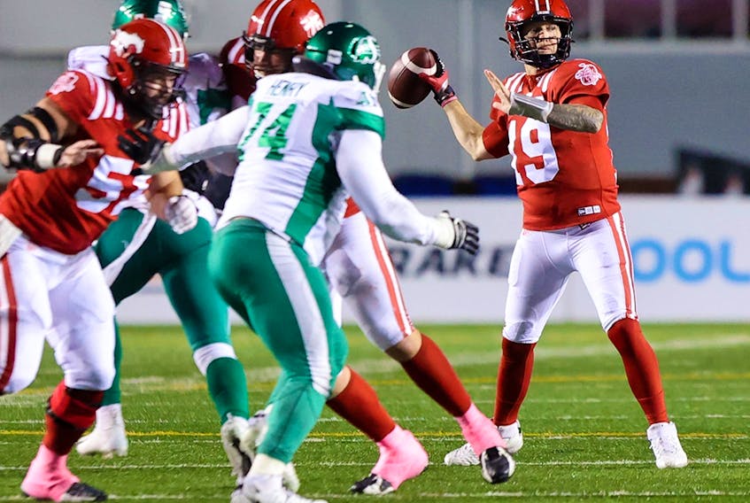 Calgary Stampeders quarterback Bo Levi Mitchell lines up a pass against the Saskatchewan Roughriders during CFL action at McMahon Stadium in Calgary on Saturday, October 23, 2021. 