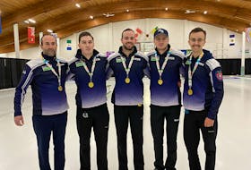 Nova Scotia, led by Owen Purcell of the Halifax Curling Club, captured the men’s title at the New Holland world juniors qualifying event Saturday in Saskatoon. From left are: coach Anthony Purcell, Scott Weagle, Adam McEachern, Joel Krats and Owen Purcell. - DARLENE DANYLIW / CURLING CANADA 