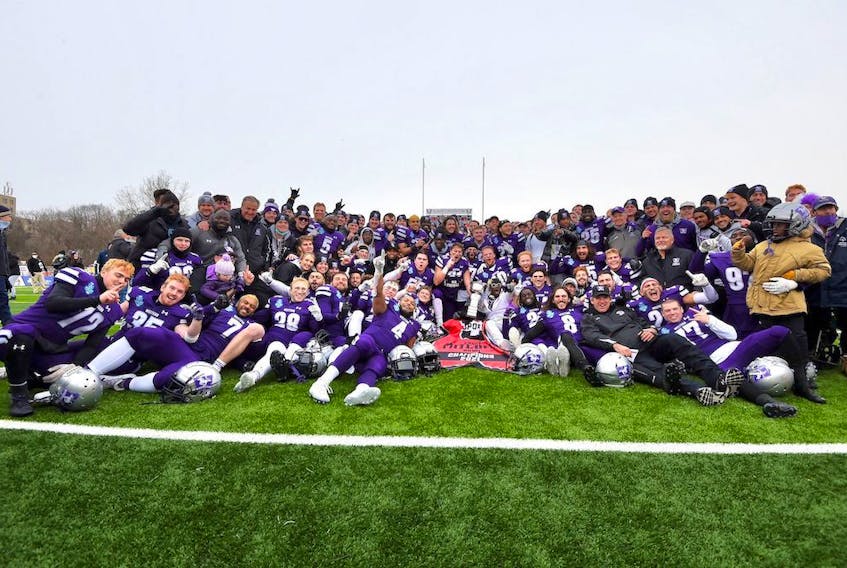 The Western Mustangs celebrate winning the Mitchell Bowl at home on Saturday. Western will make its record 15th national final appearance in next Saturday’s Vanier Cup against the Saskatchewan Huskies in Quebec City. - U SPORTS