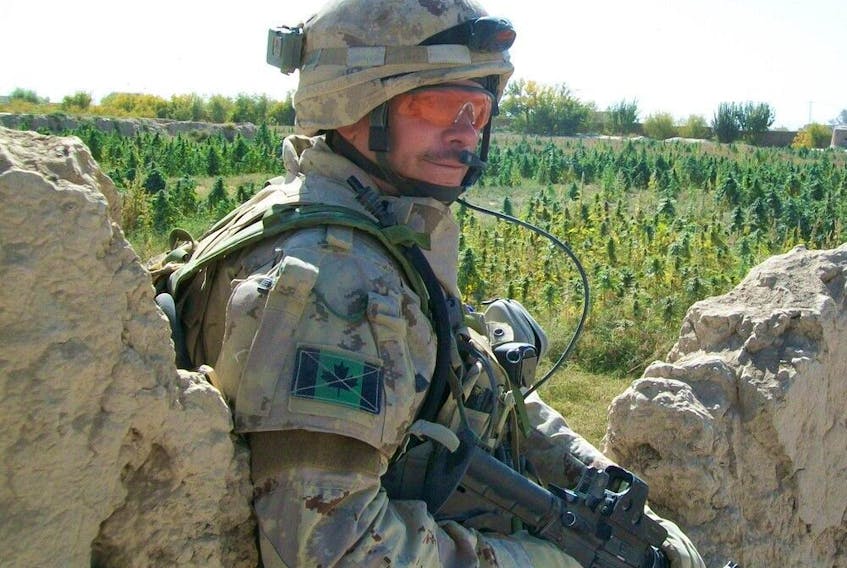 Mark Popov, then a major, is shown in this photo during a patrol in Kandahar province in Afghanistan in 2009. 