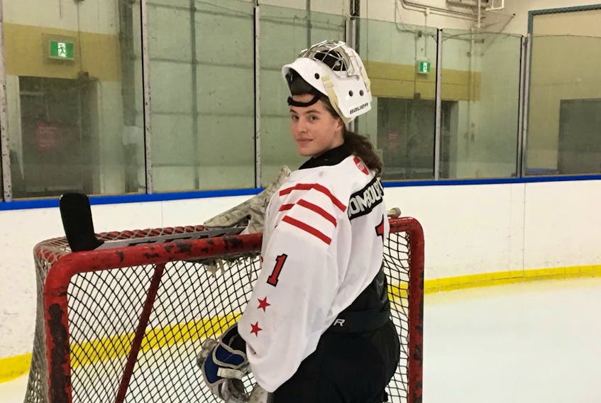 Lisa Mombourquette is a goalie for the Weeks Majors in the Nova Scotia Under-18 Boys' Hockey League. - Contributed