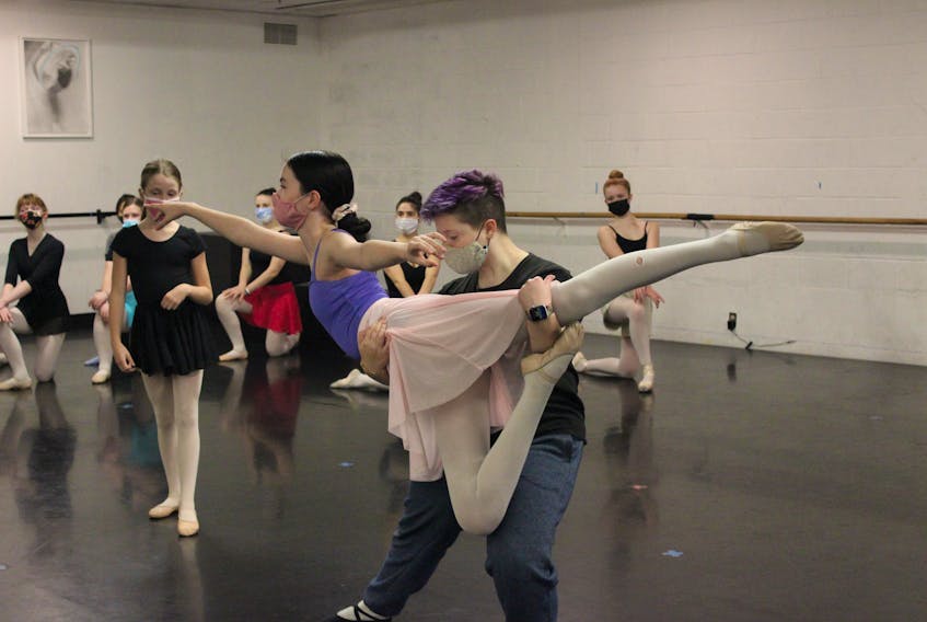 Carter Matthews lifts Lara McPhun-Hayward as they rehearse for the finale of an upcoming production of The Nutcracker, which is returning to the Confederation Centre stage for the first time in 10 years. Both are students with the Dance Umbrella program.
