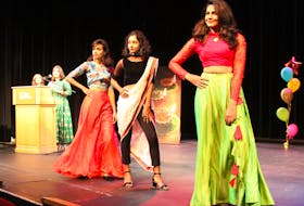 Three models showcase Indian traditional looks from different regions of the country during the Diwali fashion show at Cape Breton University on Tuesday. NICOLE SULLIVAN/CAPE BRETON POST 