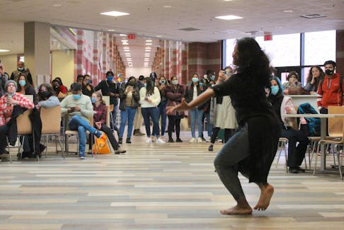 A dancer with Caper Bhangra Crew performs a traditional Indian dance in CBU cafeteria on Wednesday as part of the university's Diwali celebrations. NICOLE SULLIVAN/CAPE BRETON POST 