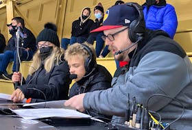 Earlier this year, Seth Hyde (centre) called a Pinnacle Growlers provincial under-18 major hockey league game with Newfoundland Growlers play-by-play man Chris Ballard (right). They are joined by Jackie Hyde, Seth’s mother, who is controlling the broadcast’s camera.