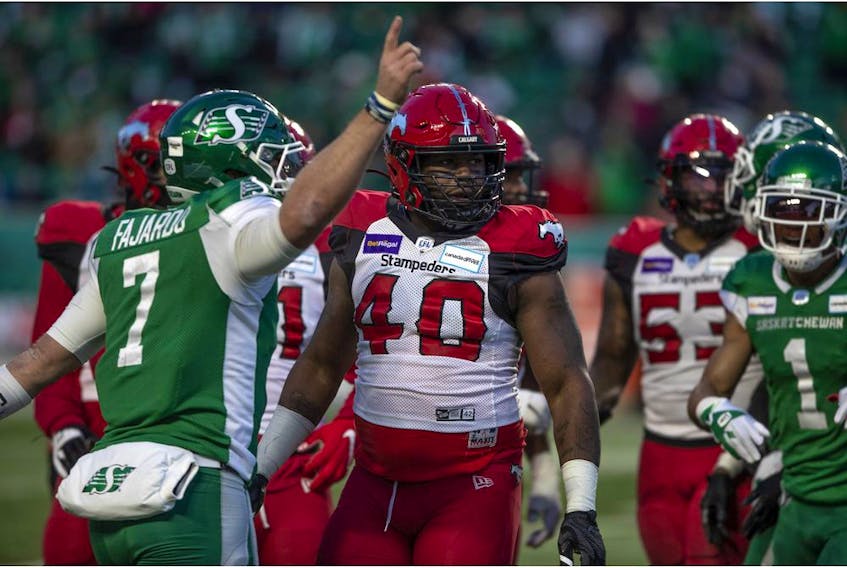 Calgary Stampeders defensive lineman Shawn Lemon looks on moments before getting ejected from the game after throwing a punch during the CFL West Division Semifinal against the Saskatchewan Roughriders, at Mosaic Stadium in Regina on Sunday, Nov. 28, 2021.