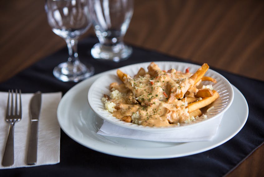 Possibly the only way to improve poutine is by putting lobster on top. The lobster poutine is a popular menu item at the Red Cap Restaurant & Motel in Middle West Pubnico.
