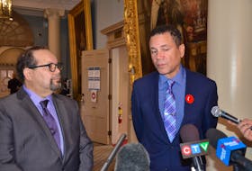 Gerry Morrison and Tony Smith, former residents of the Nova Scotia Home for Colored Children, address the final report to the legislature of the Reflection and Action Task Group on Thursday, Nov. 4, 2021, at Province House in Halifax.