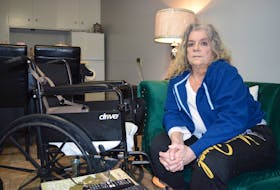 Ann Marie Racki, 69, in her apartment in New Waterford, where she says she can no longer even afford rent as the government is now taking almost half her old age security pension due to her income change in 2020 because she received the Canada Emergency Response Benefit (CERB) last year. Racki, who had a hip removed seven months ago and has been confined to a wheelchair waiting for a hip replacement, said she expected to have to pay the CERB back but not in a way to make life unliveable and now she will probably have to file for bankruptcy. Sharon Montgomery-Dupe/Cape Breton Post