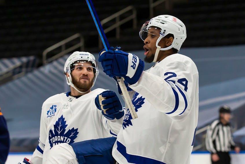 Both Hockey Diversity Alliance leader Wayne Simmonds (right) and Maple Leafs player rep Alexander Kerfoot (left) say the team has been united in its determination to make sure the what Kyle Beach went through never happens again. 