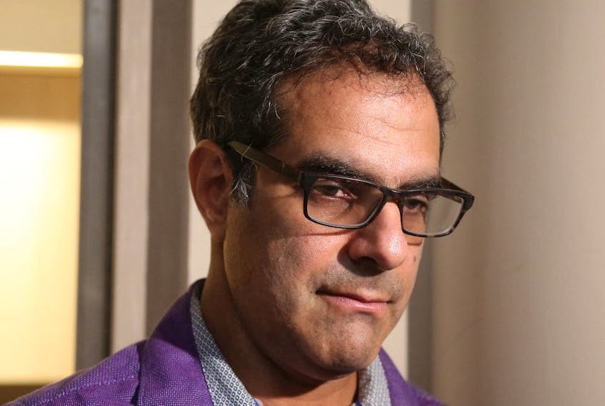 Twitter says uOttawa professor Amir Attaran violated its rules with a 'tar and feathers' tweet criticizing the federal government over delays in starting COVID-19 vaccinations for Canadian children aged 5-11.
