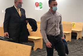 High school teacher Noel Strapp (right) leaves a provincial courtroom in St. John's with his lawyer, Ian Patey, following closing arguments in his sexual assault and exploitation trial Friday, Nov. 5. Judge Phyllis Harris will return with her decision Dec. 17. TARA BRADBURY • THE TELEGRAM