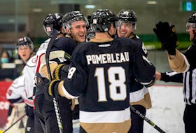 Noel Hoefenmayer (left), Tristan Pomerleau, Ryan Chyzowski and the rest of the Newfoundland Growlers celebrated a fifth consecutive win in C.B.S. Friday night. — Newfoundland Growlers/Jeff Parsons