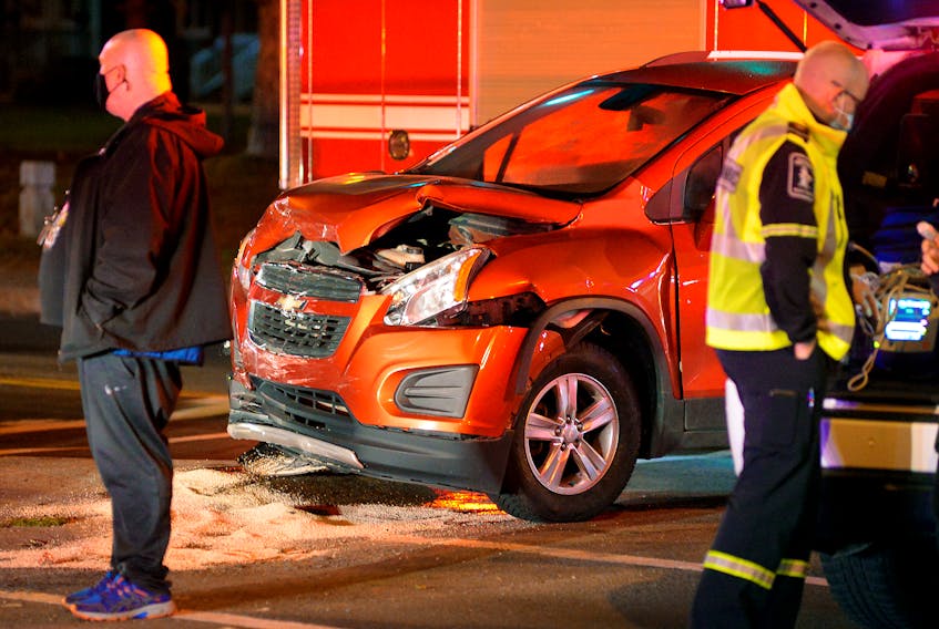Two vehicles received substantial damage during a collision in St. John's Tuesday night.
