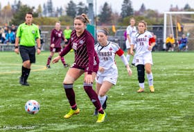 Keanna Ryan, 16, protects the ball from a UNBSJ player in an Atlantic Collegiate Athletic Association (ACAA) women’s soccer game at the Terry Fox Sports Complex in Cornwall. Darrell Theriault Photo/Holland College Athletics