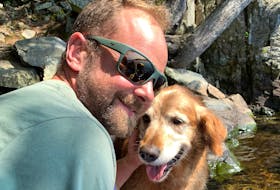 Rob McIver, pictured at Lake Charlotte with his dog Cash, spent 10 months serving in Afghanistan. The man who returned home to Nova Scotia was a very different man, he says. 