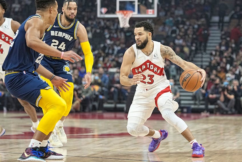 Toronto Raptors guard Fred VanVleet (23) drives to the net against Memphis Grizzlies guard Desmond Bane (22) and forward Dillon Brooks (24) during the first quarter at Scotiabank Arena.