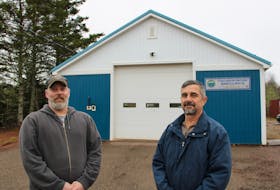 CGSAR equipment manager Steve Parker and president Tom Fitzpatrick outside the base in Debert. The new bay is being installed in the area they are standing in.