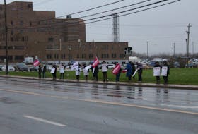 CUPE Nova Scotia members rally outside New Glasgow's Glen Haven Manor as part of a province-wide day of action.