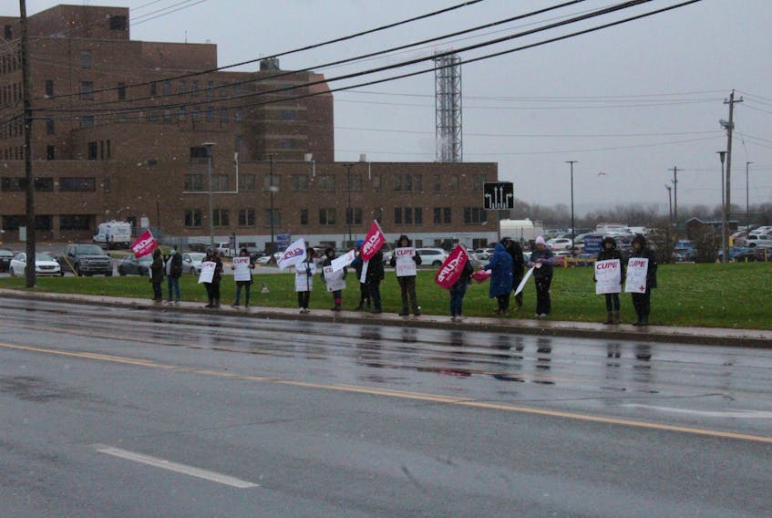 CUPE Nova Scotia members rally outside New Glasgow's Glen Haven Manor as part of a province-wide day of action.