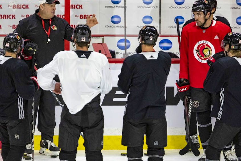 Ottawa Senators head coach D.J. Smith instructs his players during practice on Tuesday, Nov. 30, 2021. After a 1-10-1 November, the Senators want to get back on track in December.