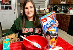 Alicia Drover of Paradise was relieved to know her grandmother, Ruby Smith, recently found a few boxes of Rice Krispies in Clarenville. There's a shortage of the cereal, which is used to make many popular cookies by people in this province during Christmas. Drover's dog, Mekah, seemed happy too.
