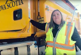 Denise Boyce, a Nova Scotia Department of Public Works plow operator from Cape Breton, stars in a reboot of the iconic 1980s “feather duster” public service announcement that reminds motorists to keep a respectful distance from snow-removal equipment. Contributed 