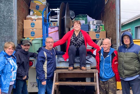 A team of volunteers in Charlottetown loads up a truck with donations for Project Love. From left are Bev Hubbard, Coady Gallant, Charles Curley, Betty Begg, Bobby Kelly and Rob Brooks.