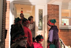 These residents loved seeing kids at their door and were in awe of the carolers, who sang from the sidewalk.