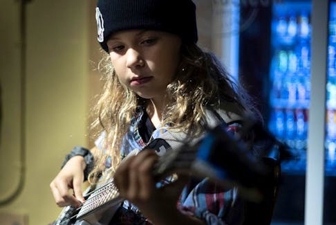 Nine-year-old Tennessee Rupnek takes rock 'n' roll classes at Immersion Rock Montreal, where kids form their own bands.