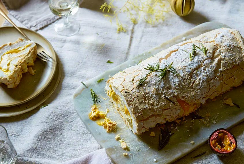 Meringue roulade with clementine curd, cream and passion fruit from Sea & Shore. Kim Lightbody photo