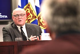 Dr. Robert Strang, Nova Scotia's chief medical officer of health, speaks to reporters at the provincial government's media room in Halifax on Monday, Dec. 13, 2021. - Communications Nova Scotia