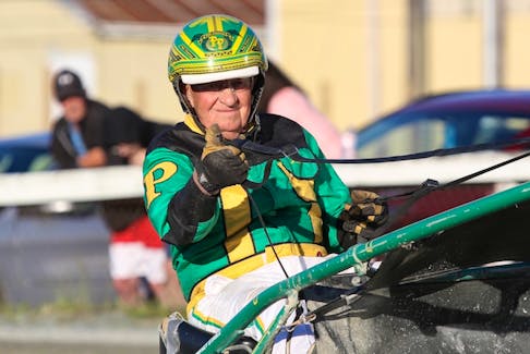 Phil Pinkney, seen here on his racing bike, was an outstanding harness racing driver and trainer, was also a great ambassador for his sport. Contributed.