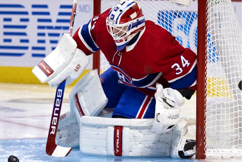 Montreal Canadiens goaltender Jake Allen gets ready to make a save against the Los Angeles Kings in Montreal on Nov. 9, 2021.